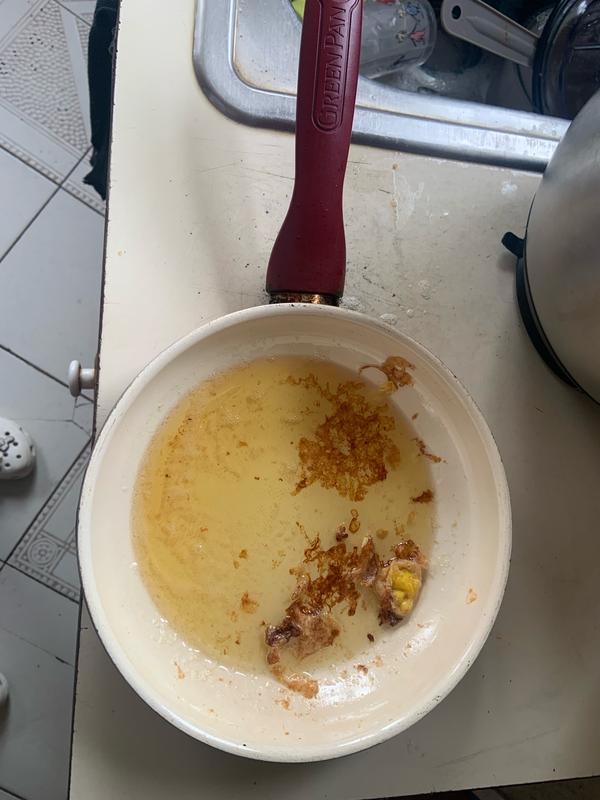 I was frying an egg and this is how it turned out. Sticking to the pan.