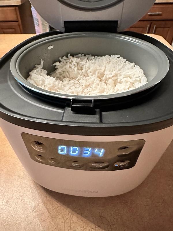 Customer photo for "Compact, stylish rice cooker that cooks up to 8 cups perfectly, is easy to use, and delivers great results even with my little user error!"