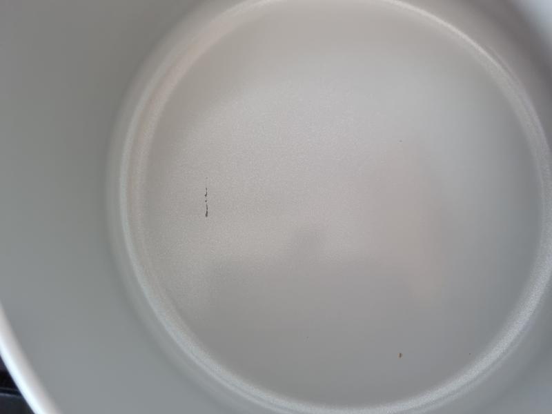 Small scratch in 1st week using masher so I'd  avoid metal masher.