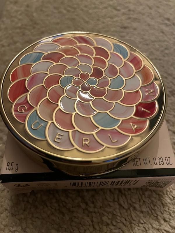 Customer photo for "Lovely sweet scent, beautiful packaging and a nice pressed powder!"
