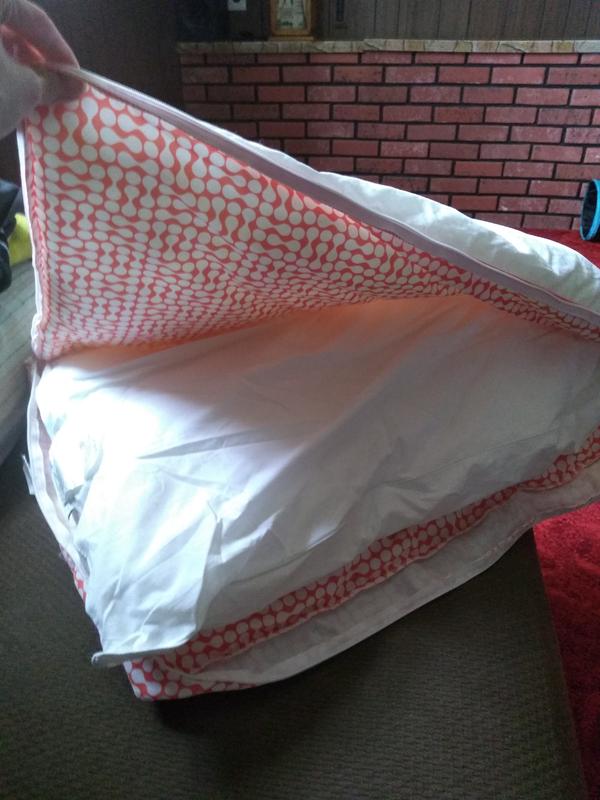 Unzips to reveal another pillow