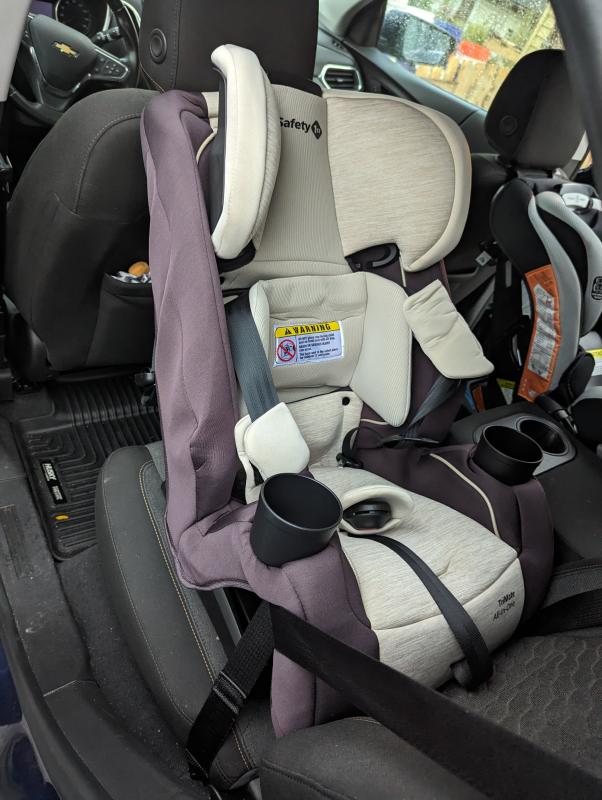 View of seat installation, rear facing with seatbelt| Another view of the car seat| View of opposite side with a second car seat installed