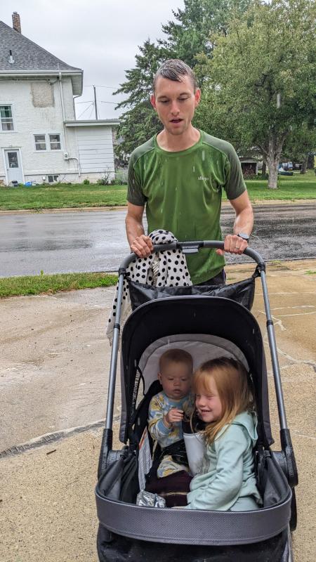 Testing out the uphill capabilities.| Folds easy and compact.| Box description- Footwell "zips out for easy cleaning or for optimal storage." No instructions in the manual.| Wheels for all-terrian.| Nature park outing.| Caught in the rain-towel covering the gap.| Still dry!| Splash pad with my 5 & 3 year olds.| Loaded up for the pool!| Caught in the rain- notice the gap between the canopies.| Pushing the girls at a nature park.