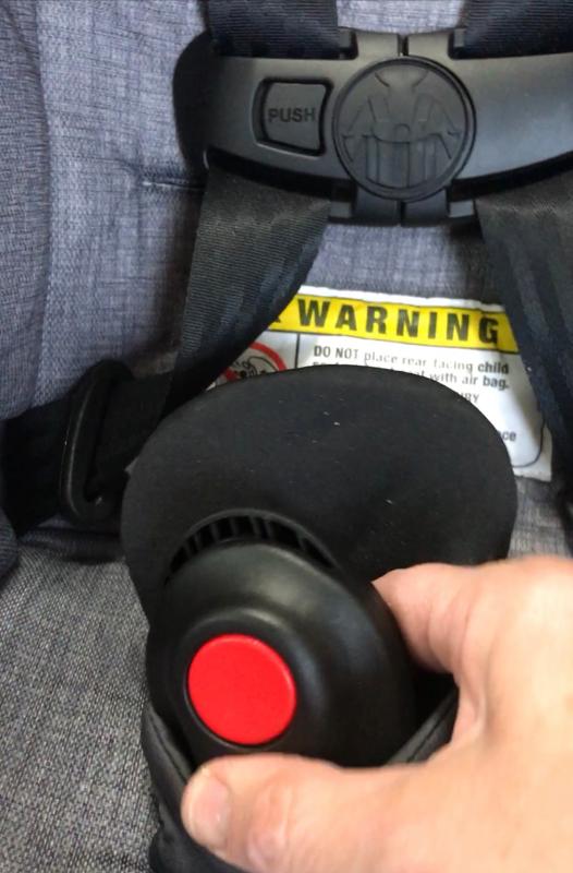 It's a tight fit in a compact car, but still work and surprisingly enough leg room.| Buckle guard!