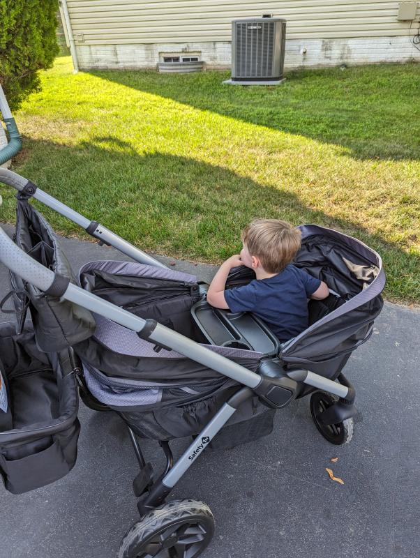 Lots of foot room with zip out well for cleaning| Side pocket holds small child cup but not adult waterbottle| Sufficient spf50 sun coverage| Plenty of head room for my three year old| We are big fans!| Spacious storage basket