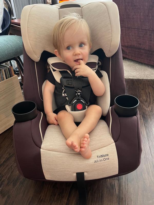 Happy kiddo in his new car seat!| Easy installation| He loves having the cup holders!| He wanted to try it out right away!