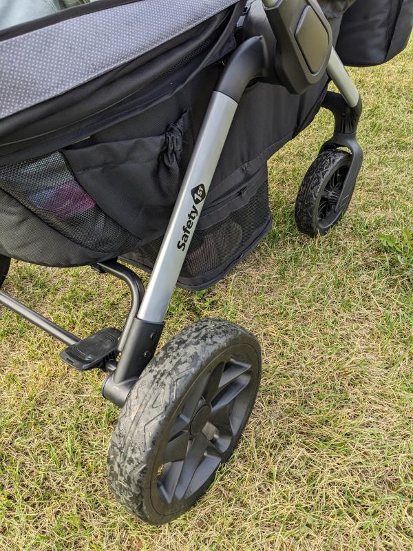 Testing out the uphill capabilities.| Folds easy and compact.| Box description- Footwell "zips out for easy cleaning or for optimal storage." No instructions in the manual.| Wheels for all-terrian.| Nature park outing.| Caught in the rain-towel covering the gap.| Still dry!| Splash pad with my 5 & 3 year olds.| Loaded up for the pool!| Caught in the rain- notice the gap between the canopies.| Pushing the girls at a nature park.