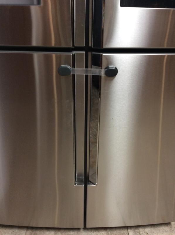 I love this little strap!!!!!!!!| Looks great!  Does not distract from the clean lines of my refrigerator!