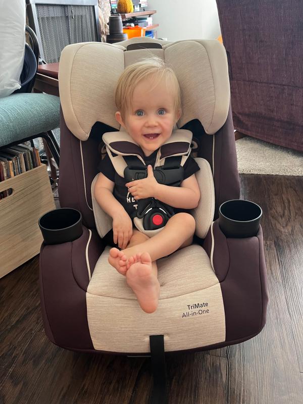 Happy kiddo in his new car seat!| Easy installation| He loves having the cup holders!| He wanted to try it out right away!