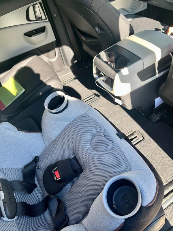 On/Off switch for fan (once flipped on, it will start automatically in hot temps)| Cord routed under floor mat and plugged into center console| Front-facing with a tall 5.5 year old| Installed front facing| Rear-facing with a tall two year old