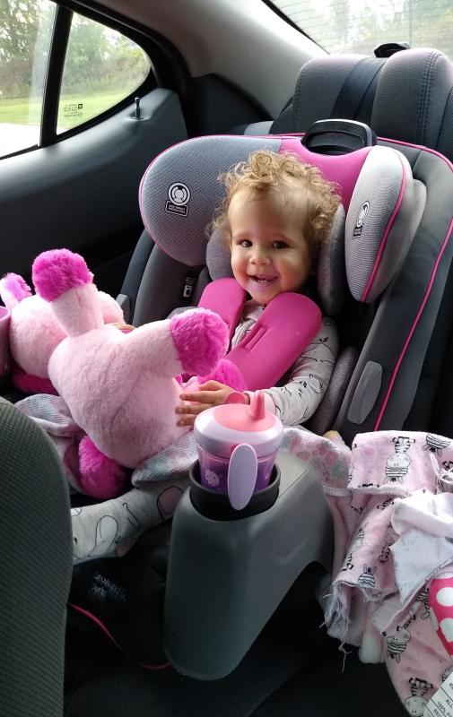 Brayleigh going for a ride with Grammie.