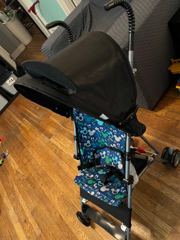 Very flimsy, not the best quality. However it is small & good for quick trips.| Very cute Mickey Mouse design and color scheme! Love the ears on top of the shade.| Tiny tiny storage basket, can not really hold anything.