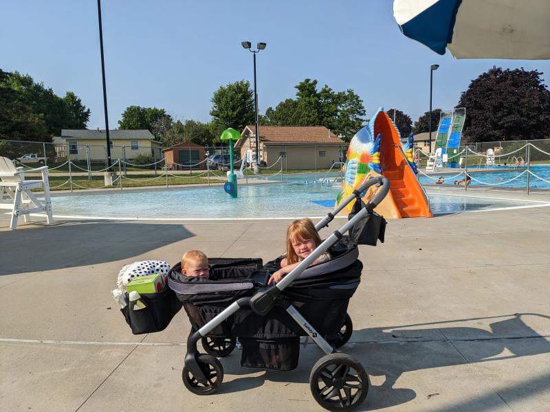 Testing out the uphill capabilities.| Folds easy and compact.| Box description- Footwell "zips out for easy cleaning or for optimal storage." No instructions in the manual.| Wheels for all-terrian.| Nature park outing.| Caught in the rain-towel covering the gap.| Still dry!| Splash pad with my 5 & 3 year olds.| Loaded up for the pool!| Caught in the rain- notice the gap between the canopies.| Pushing the girls at a nature park.
