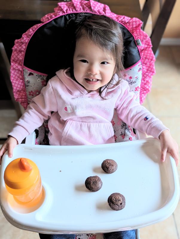 Loving her high chair!