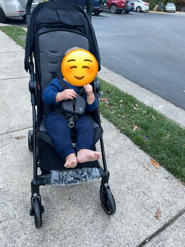 Baby Boy loving being upright and watching where he is going!