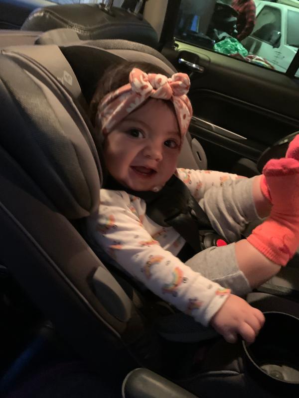 Someone is happy in her new car seat!