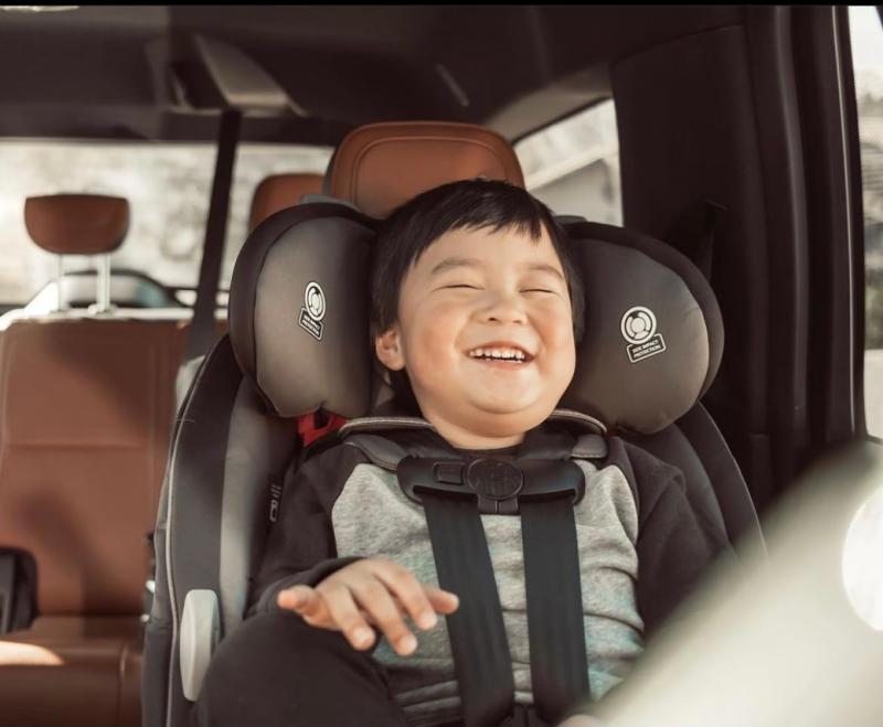 Happy in his carseat
