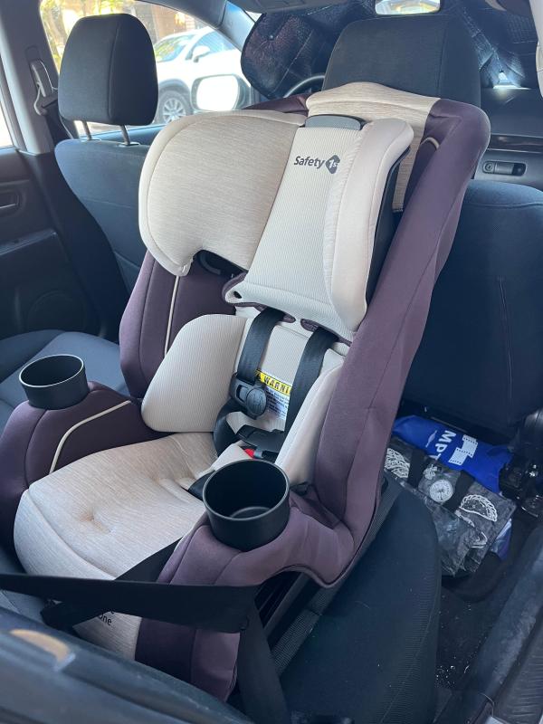Happy kiddo in his new car seat!| Easy installation| He loves having the cup holders!| He wanted to try it out right away!