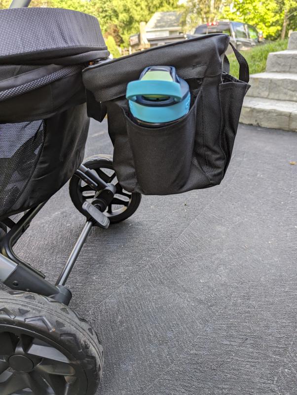 Lots of foot room with zip out well for cleaning| Side pocket holds small child cup but not adult waterbottle| Sufficient spf50 sun coverage| Plenty of head room for my three year old| We are big fans!| Spacious storage basket