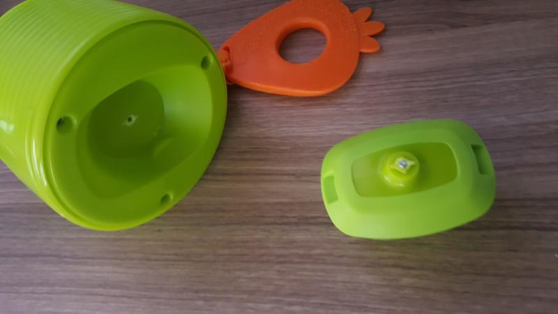 Up close of removable piece with metal exposed screw