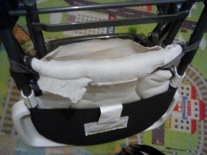 BOTH chairs did this due to the cheap inadequate lining material.| Back lining materials splits open allowing the partial board to slip out.| Additionally one chairs poles that fit into the tray disconnected since day one causing you to need to reassemble them into the tray portion...this chair seemed to lean back further then the other too.