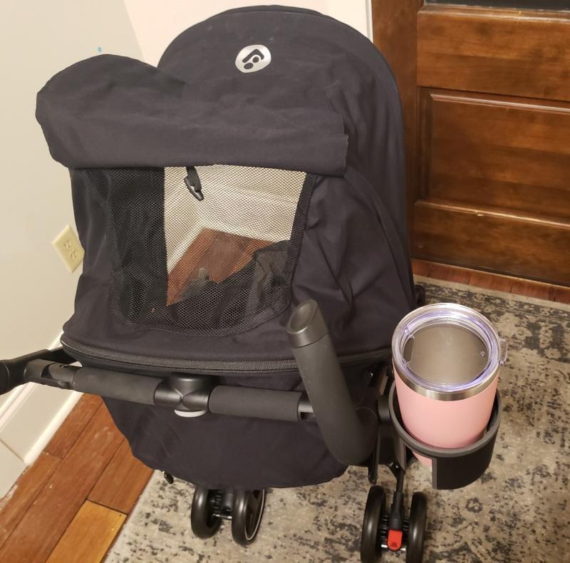 Adjustable footrest| Love the cupholder adapter included! Mesh window is great too.| Padded body and straps for comfort, large canopy for sun protection| This shows the adapters in place| Recline positions are adjustable| Love the zippered pouch!| Decent size for compact stroller, but my main diaper bag is too large.