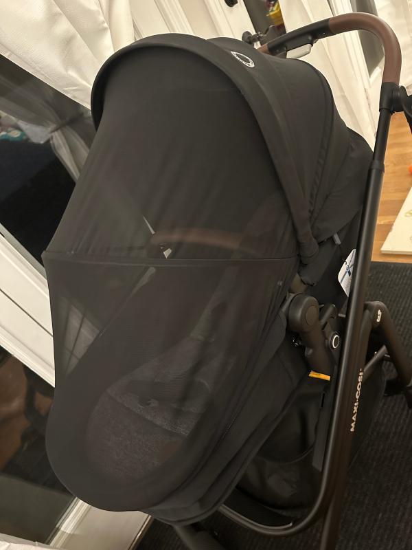 Stands by itself when folded!| Lever to adjust stroller seat recline| Bassinet setting when stroller seat is fully reclined| Included rain shield| Love the 360 degree canopy!| Straps need to be pulled together before being inserted into bottom buckle| Stroller with car seat| Small basket