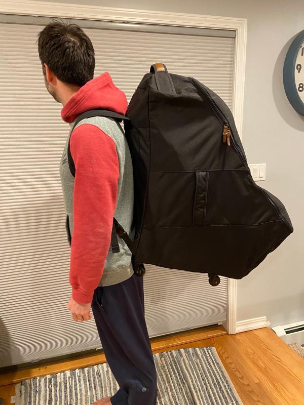 Easy to carry as a backpack| With 2 car seats| Backpack straps tuck away easily| With 2 car seats