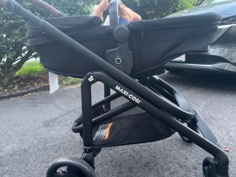 Stands by itself when folded!| Lever to adjust stroller seat recline| Bassinet setting when stroller seat is fully reclined| Included rain shield| Love the 360 degree canopy!| Straps need to be pulled together before being inserted into bottom buckle| Stroller with car seat| Small basket