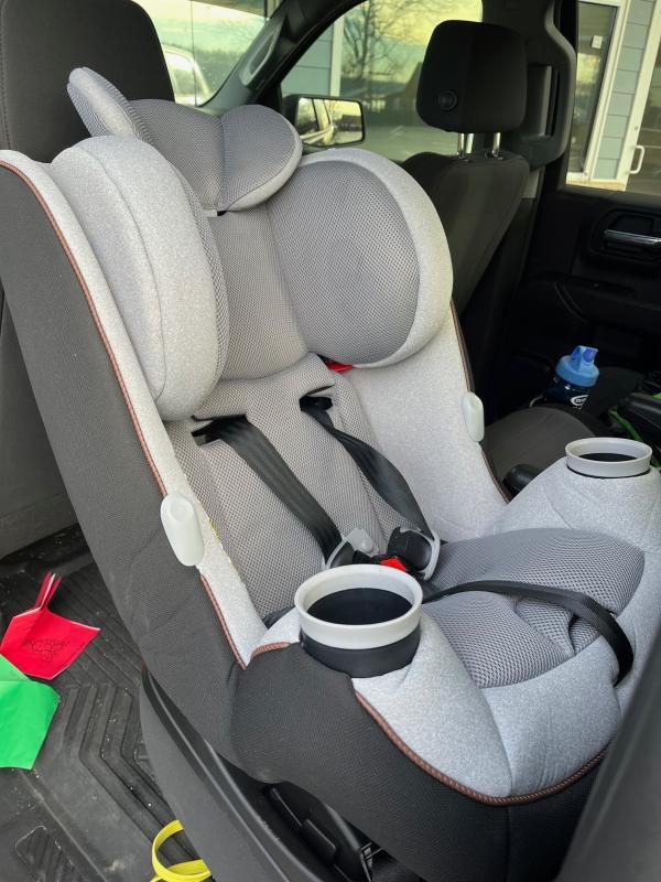so excited for the new seat| magic clip chest strap| comfort and cup holder| space between driver seat and car seat is fairly tight
