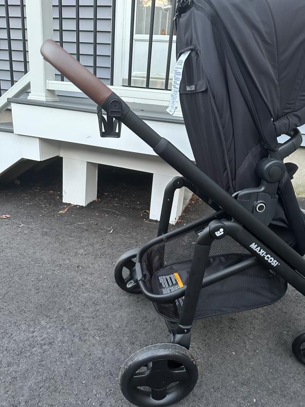 Stands by itself when folded!| Lever to adjust stroller seat recline| Bassinet setting when stroller seat is fully reclined| Included rain shield| Love the 360 degree canopy!| Straps need to be pulled together before being inserted into bottom buckle| Stroller with car seat| Small basket