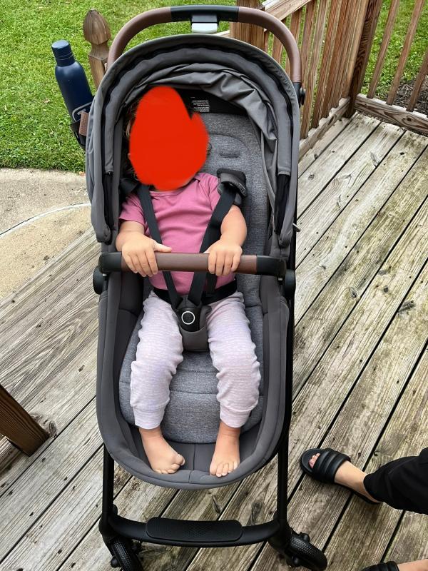 Storage basket capacity| Love that the seat gets deep like a bassinet| Netting on side, good ventilation, bad blocking out light| Extended visor provides ample coverage| 2 year old for size comparison| Bug net is awesome!| 7 month old for size comparison