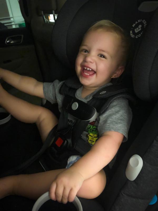 Easy to access cup holders!| This girl loved the car seat even out side of the car!| A happy girl in her new car seat!