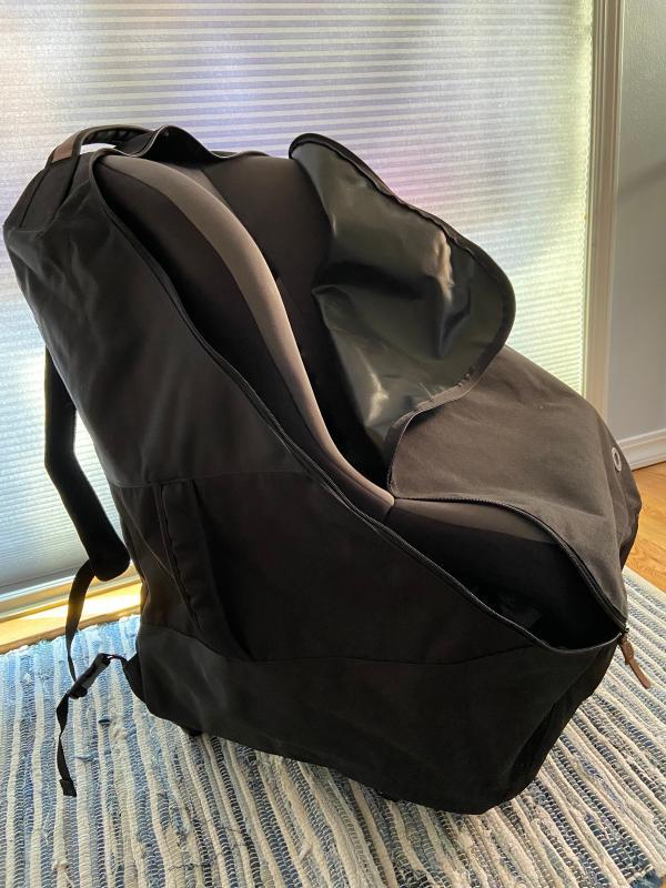 Easy to carry as a backpack| With 2 car seats| Backpack straps tuck away easily| With 2 car seats