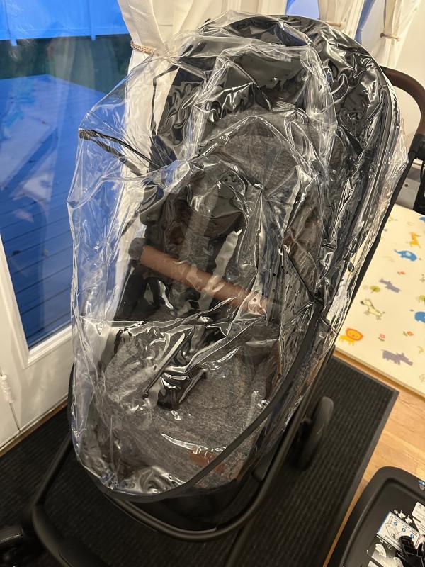 Stands by itself when folded!| Lever to adjust stroller seat recline| Bassinet setting when stroller seat is fully reclined| Included rain shield| Love the 360 degree canopy!| Straps need to be pulled together before being inserted into bottom buckle| Stroller with car seat| Small basket