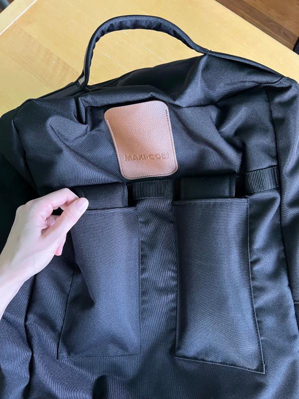 Pockets for the backpack straps| The wheels and platform base