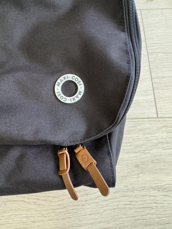 360* wheels that glide like butter| Backpack straps with padding| One of many handles| Double zipper with gorgeous tabs