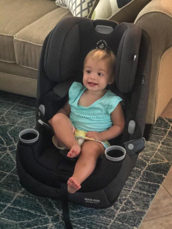 Easy to access cup holders!| This girl loved the car seat even out side of the car!| A happy girl in her new car seat!