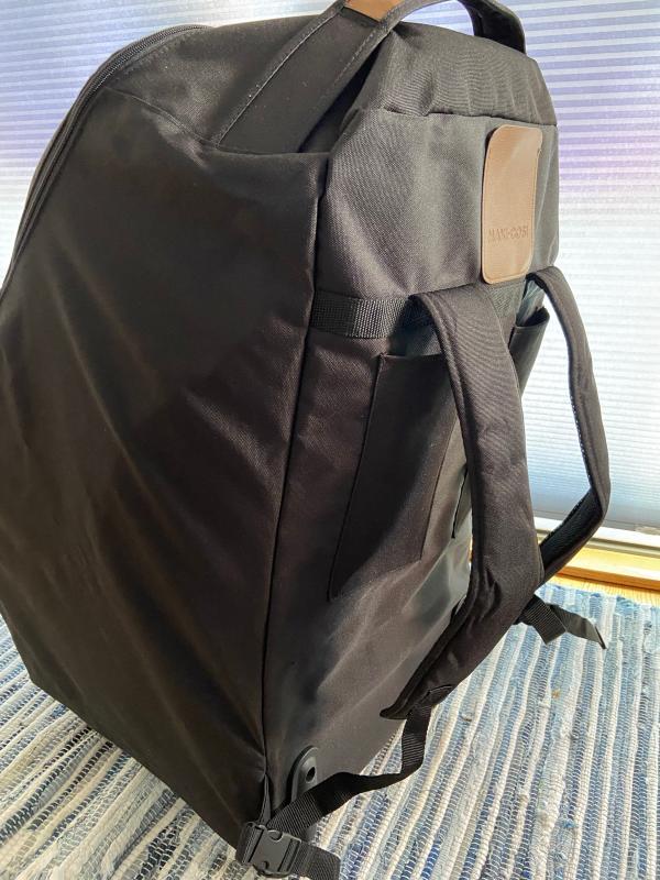 Easy to carry as a backpack| With 2 car seats| Backpack straps tuck away easily| With 2 car seats