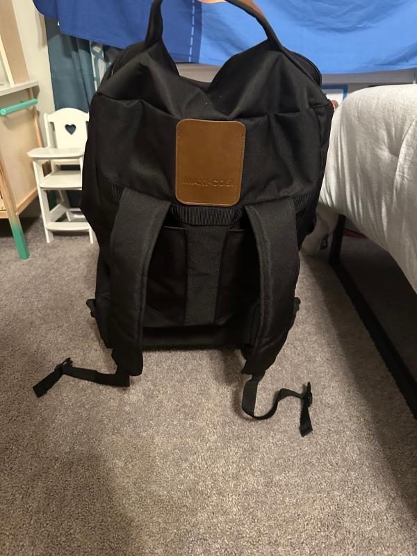 Front| Top| Back with straps tucked in| Wheels| Back with straps untucked