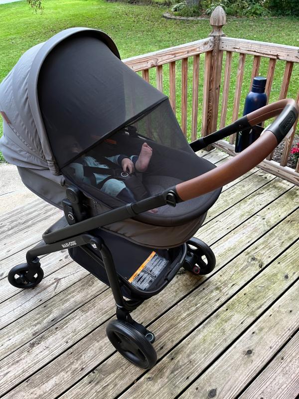 Storage basket capacity| Love that the seat gets deep like a bassinet| Netting on side, good ventilation, bad blocking out light| Extended visor provides ample coverage| 2 year old for size comparison| Bug net is awesome!| 7 month old for size comparison