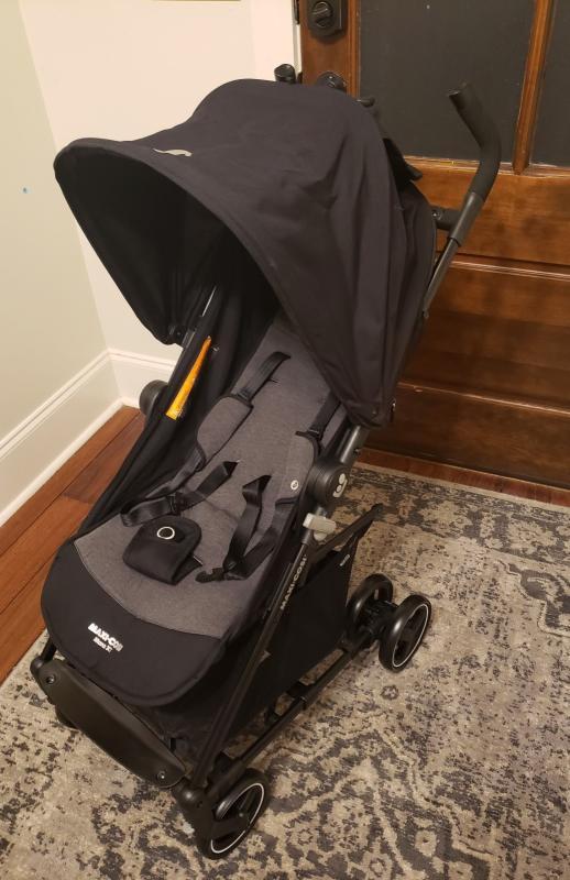 Adjustable footrest| Love the cupholder adapter included! Mesh window is great too.| Padded body and straps for comfort, large canopy for sun protection| This shows the adapters in place| Recline positions are adjustable| Love the zippered pouch!| Decent size for compact stroller, but my main diaper bag is too large.