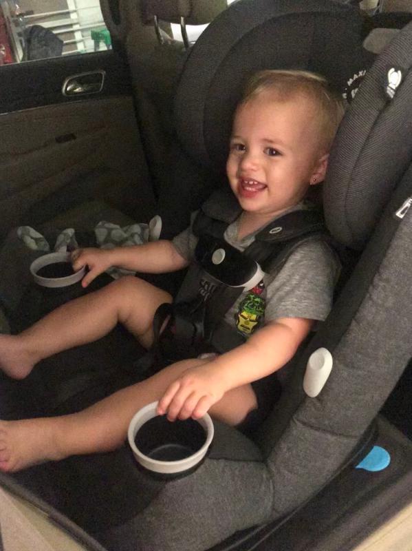 Easy to access cup holders!| This girl loved the car seat even out side of the car!| A happy girl in her new car seat!