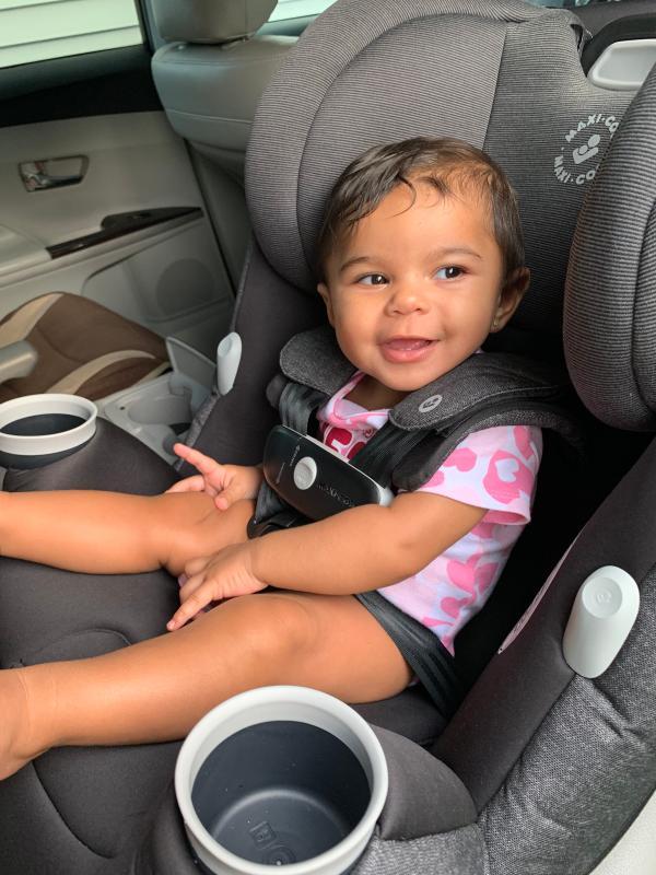 Enjoying her new car seat