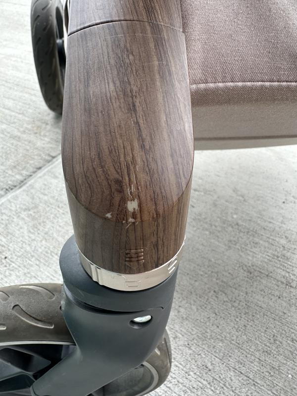 Flaking paint and rubbed off wood grain