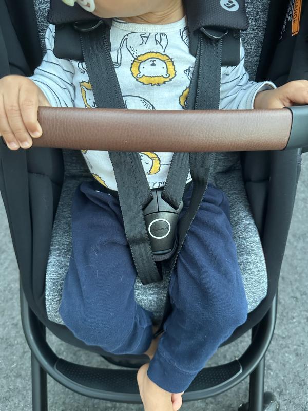Stands by itself when folded!| Lever to adjust stroller seat recline| Bassinet setting when stroller seat is fully reclined| Included rain shield| Love the 360 degree canopy!| Straps need to be pulled together before being inserted into bottom buckle| Stroller with car seat| Small basket
