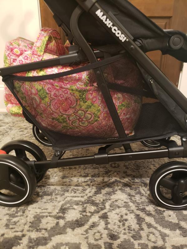 Adjustable footrest| Love the cupholder adapter included! Mesh window is great too.| Padded body and straps for comfort, large canopy for sun protection| This shows the adapters in place| Recline positions are adjustable| Love the zippered pouch!| Decent size for compact stroller, but my main diaper bag is too large.