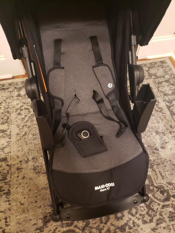 Adjustable footrest| Love the cupholder adapter included! Mesh window is great too.| Padded body and straps for comfort, large canopy for sun protection| This shows the adapters in place| Recline positions are adjustable| Love the zippered pouch!| Decent size for compact stroller, but my main diaper bag is too large.
