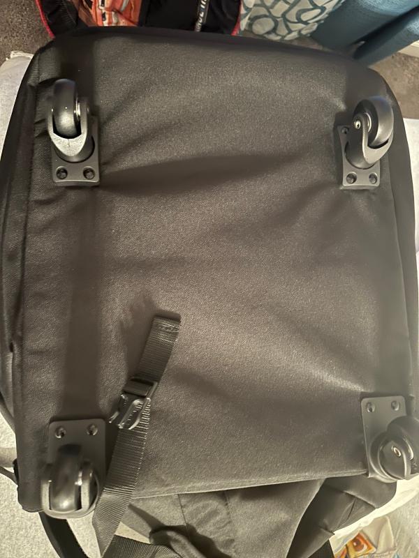 Front| Top| Back with straps tucked in| Wheels| Back with straps untucked