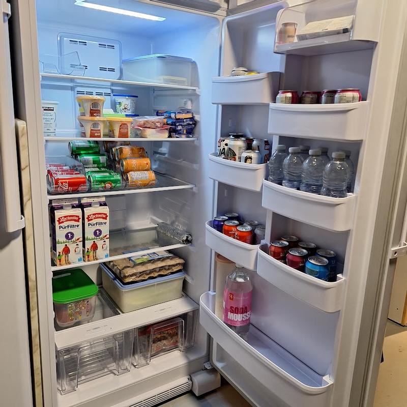 Perfect second fridge for our basement. looks empty now but it's waiting for Christmas time !!